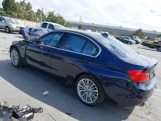 2012 BMW 3 Series 328i with VIN WBA3C1C57CF431824, listed as a IAAI auction lot 42585462 with 183,008 mi miles and . Bid and sale history available at DreamBid. Image 3.