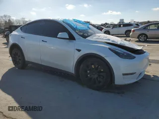 2023 Tesla Model Y Long Range with VIN 7SAYGAEE3PF767171, listed as a Copart auction lot 46057645 with Not Provided miles and Salvage Title. Bid and sale history available at DreamBid. Image 4.