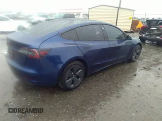2023 Tesla Model 3 z VIN 5YJ3E1EA4PF576045, wystawiony jako IAAI lot #41565981 z przebiegiem Nie podano mil oraz . Historia ofert i sprzedaży dostępna na DreamBid. Obrazek 4.