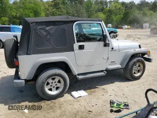 2004 Jeep Wrangler Sport with VIN 1J4FA49S44P788467, listed as a Copart auction lot 55395625 with 187,289 mi miles and Salvage title. Bid and sale history available at DreamBid. Image 3.