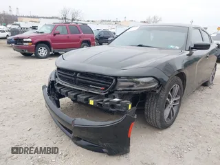 2019 Dodge Charger SXT with VIN 2C3CDXJG7KH757728, listed as a IAAI auction lot 41797017 with 68,063 mi miles and . Bid and sale history available at DreamBid. Image 6.