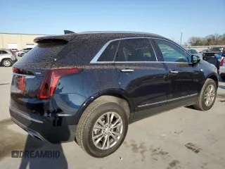 2021 Cadillac XT5 FWD Premium Luxury with VIN 1GYKNCRS5MZ138712, listed as a Copart auction lot 49697945 with 54,893 mi miles and Salvage Title. Bid and sale history available at carsss.com. Image 3.