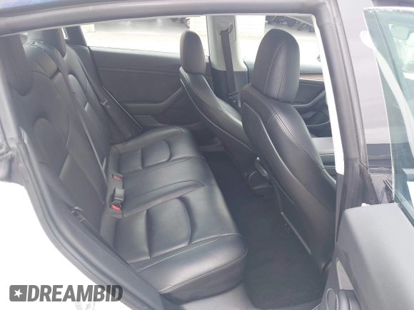 2023 Tesla Model 3 z VIN 5YJ3E1EA8PF437584, wystawiony jako IAAI lot #42112679 z przebiegiem 52 574 mil mil oraz . Historia ofert i sprzedaży dostępna na DreamBid. Obrazek 8.