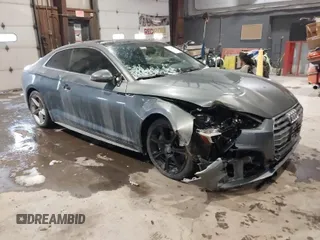 2018 Audi A5 Premium Plus with VIN WAUTNAF50JA011354, listed as a IAAI auction lot 41396659 with 74,936 mi miles and . Bid and sale history available at DreamBid. Image 1.