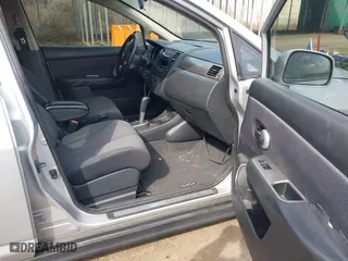 2009 Nissan Versa 1.8 SL with VIN 3N1BC13E19L418874, listed as a IAAI auction lot 41698587 with 154,568 mi miles. Bid and sale history available at carsss.com. Image 5.