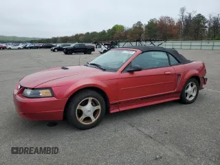 2001 Ford Mustang Deluxe z VIN 1FAFP444X1F234869, wystawiony jako Copart lot #57380035 z przebiegiem 84 074 mil mil oraz Szkoda całkowita • Salvage title. Historia ofert i sprzedaży dostępna na DreamBid. Obrazek 1.