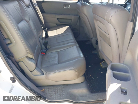2011 Honda Pilot EX-L with VIN 5FNYF4H69BB091503, listed as a IAAI auction lot 42103011 with 246,816 mi miles and . Bid and sale history available at carsss.com. Image 8.