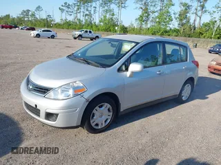 2012 Nissan Versa S with VIN 3N1BC1CP7CK253573, listed as a IAAI auction lot 42035812 with 97,026 mi miles. Bid and sale history available at carsss.com. Image 2.