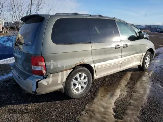 2005 Kia Sedona LX with VIN KNDUP131X56672224, listed as a Copart auction lot 88444405 with 151,386 mi miles and Salvage Title. Bid and sale history available at carsss.com. Image 3.