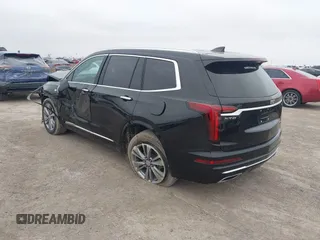 2023 Cadillac XT6 FWD Premium Luxury with VIN 1GYKPCRS8PZ231089, listed as a IAAI auction lot 41500954 with 36,455 mi miles and . Bid and sale history available at DreamBid. Image 3.