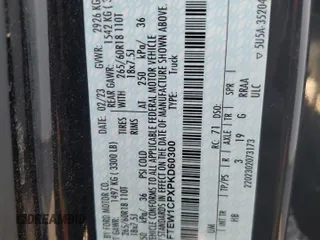 2023 Ford F-150 XL z VIN 1FTEW1CPXPKD60300, wystawiony jako Copart lot #62825095 z przebiegiem Nie podano mil oraz Nie do naprawy • Non repairable. Historia ofert i sprzedaży dostępna na DreamBid. Obrazek 13.