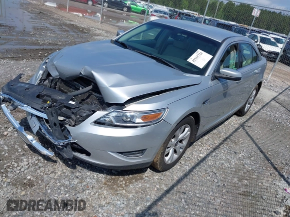 2012 Ford Taurus SEL z VIN 1FAHP2EW4CG137421, wystawiony jako IAAI lot #41915724 z przebiegiem 129 869 mil mil oraz . Historia ofert i sprzedaży dostępna na DreamBid. Obrazek 2.