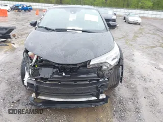 2018 Toyota C-HR XLE with VIN NMTKHMBX4JR032773, listed as a IAAI auction lot 41957588 with 100,691 mi miles. Bid and sale history available at carsss.com. Image 13.