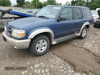 2000 Ford Explorer Eddie Bauer with VIN 1FMZU74E5YZA26011, listed as a Copart auction lot 59954945 with 283,681 mi miles and Salvage title. Bid and sale history available at DreamBid. Image 1.