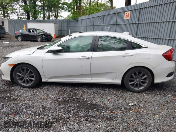 2019 Honda Civic EX z VIN 19XFC1F35KE200536, wystawiony jako IAAI lot #42198146 z przebiegiem 7 231 mil mil oraz . Historia ofert i sprzedaży dostępna na DreamBid. Obrazek 13.