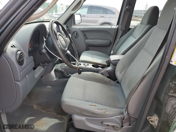 2005 Jeep Liberty Sport with VIN 1J4GL48K65W504490, listed as a Copart auction lot 49766245 with 217,458 mi miles and Salvage Title. Bid and sale history available at carsss.com. Image 7.