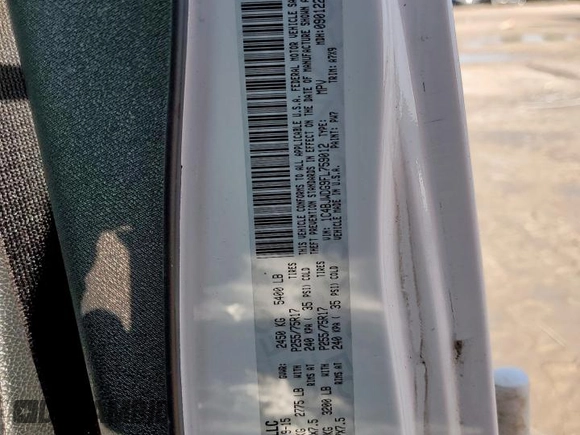 2015 Jeep Wrangler Unlimited Sport with VIN 1C4BJWDG9FL759012, listed as a Copart auction lot 61002465 with 101,395 mi miles and Salvage title. Bid and sale history available at DreamBid. Image 13.