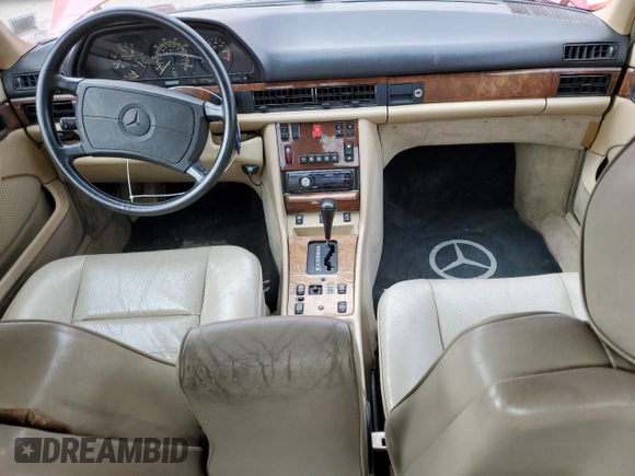 1987 Mercedes-Benz 560 with VIN WDBCA45D6HA348824, listed as a Copart auction lot 49355285 with 281,540 mi miles and Clean Title. Bid and sale history available at DreamBid. Image 8.