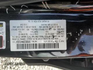 2011 Mazda CX-7 i SV z VIN JM3ER2AMXB0396845, wystawiony jako Copart lot #52347865 z przebiegiem 171 487 mil mil oraz Szkoda całkowita • Salvage title. Historia ofert i sprzedaży dostępna na DreamBid. Obrazek 13.
