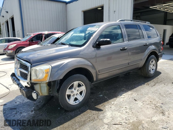 2004 Dodge Durango SLT with VIN 1D4HD48NX4F167468, listed as a Copart auction lot 56665595 with 275,747 mi miles and Salvage title. Bid and sale history available at DreamBid. Image 1.