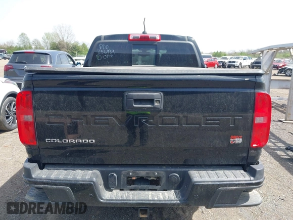 2021 Chevrolet Colorado 4WD Z71 z VIN 1GCGTDEN1M1256939, wystawiony jako IAAI lot #42071364 z przebiegiem 38 972 mil mil oraz . Historia ofert i sprzedaży dostępna na DreamBid. Obrazek 16.
