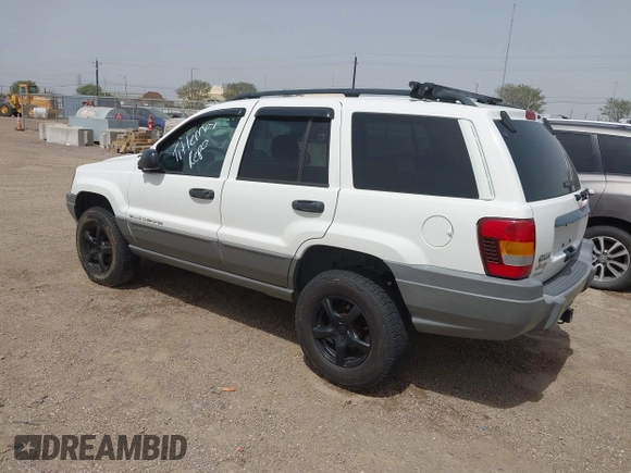 2002 Jeep Grand Cherokee with VIN 1J8GW38S62C219396, listed as a IAAI auction lot 41831930 with 196,167 mi miles and . Bid and sale history available at DreamBid. Image 3.