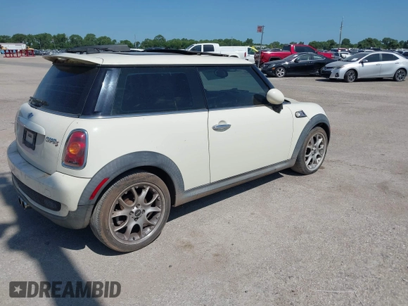 2007 MINI Hardtop S with VIN WMWMF73517TL83792, listed as a IAAI auction lot 42680017 with 135,631 mi miles and . Bid and sale history available at DreamBid. Image 4.