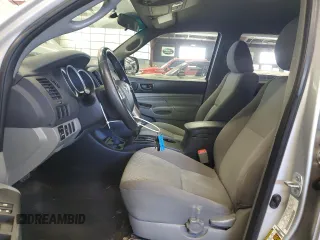2012 Toyota Tacoma PreRunner with VIN 5TFJX4GN7CX013266, listed as a Copart auction lot 57114145 with 229,522 mi miles and Clean title. Bid and sale history available at DreamBid. Image 7.