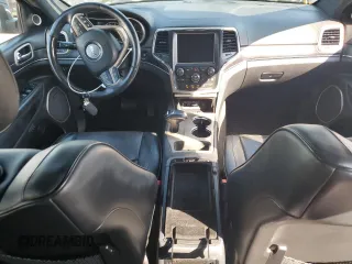 2015 Jeep Grand Cherokee Summit с VIN 1C4RJEJG6FC125668, выставлен на аукционе Copart как лот 78878474 с пробегом 87 445 миль миль и Списание • Salvage title. История ставок и продаж доступна на DreamBid. Изображение 8.