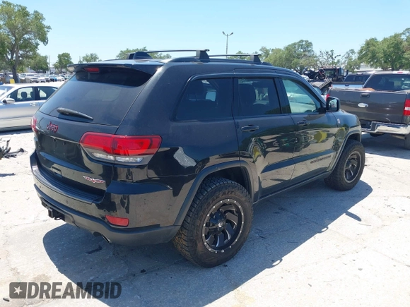 2017 Jeep Grand Cherokee Trailhawk with VIN 1C4RJFLG3HC836072, listed as a IAAI auction lot 42073775 with 139,374 mi miles and . Bid and sale history available at DreamBid. Image 4.