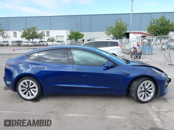 2021 Tesla Model 3 Standard Range Plus z VIN 5YJ3E1EA9MF020860, wystawiony jako IAAI lot #42246074 z przebiegiem 52 674 mil mil oraz . Historia ofert i sprzedaży dostępna na DreamBid. Obrazek 13.
