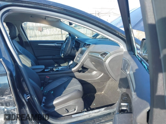 2014 Ford Fusion Titanium with VIN 3FA6P0K90ER336116, listed as a IAAI auction lot 41559792 with 132,852 mi miles. Bid and sale history available at carsss.com. Image 5.
