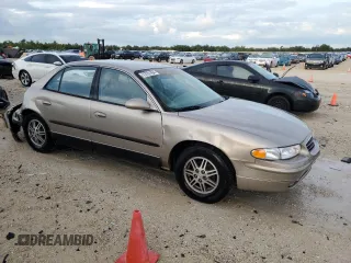 1999 Buick Regal LS with VIN 2G4WB52K4X1601132, listed as a Copart auction lot 73761404 with 92,842 mi miles and Salvage Title. Bid and sale history available at carsss.com. Image 4.
