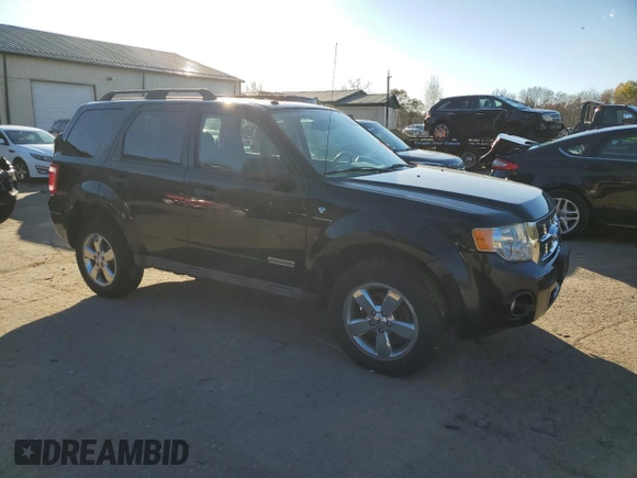 2008 Ford Escape XLT with VIN 1FMCU93168KD23345, listed as a Copart auction lot 77482674 with 142,607 mi miles and Clean title. Bid and sale history available at DreamBid. Image 4.