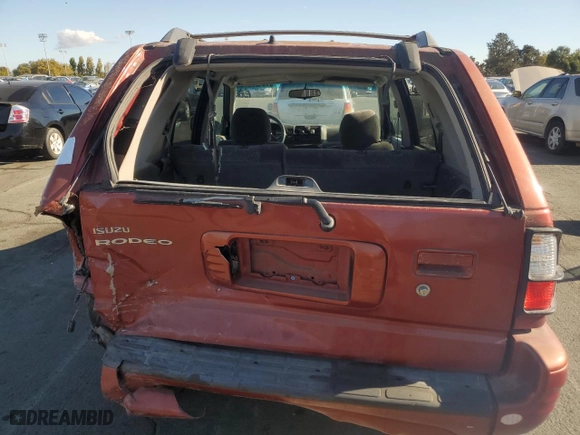 2001 Isuzu Rodeo S with VIN 4S2CK58W014302125, listed as a Copart auction lot 76425614 with 204,350 mi miles and Salvage Title. Bid and sale history available at carsss.com. Image 6.