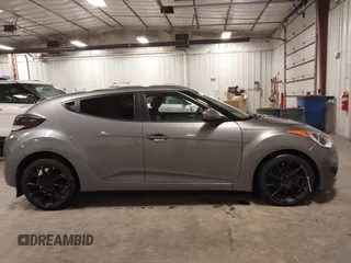 2016 Hyundai Veloster with VIN KMHTC6ADXGU272594, listed as a IAAI auction lot 42437409 with 91,620 mi miles and . Bid and sale history available at DreamBid. Image 13.