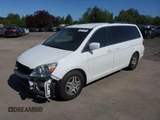 2006 Honda Odyssey EX with VIN 5FNRL38416B061004, listed as a Copart auction lot 58217225 with 126,421 mi miles and Salvage title. Bid and sale history available at DreamBid. Image 1.