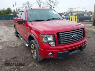2011 Ford F-150 XLT with VIN 1FTFW1ET6BFD33921, listed as a IAAI auction lot 41821721 with 142,576 mi miles. Bid and sale history available at carsss.com. Image 1.