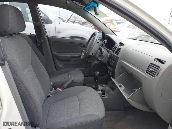 2005 Kia Rio with VIN KNADC125856400669, listed as a IAAI auction lot 41165059 with 181,338 mi miles. Bid and sale history available at carsss.com. Image 5.