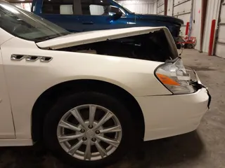 2011 Buick Lucerne CXL with VIN 1G4HC5EM1BU151570, listed as a IAAI auction lot 41815302 with 142,803 mi miles and . Bid and sale history available at DreamBid. Image 18.
