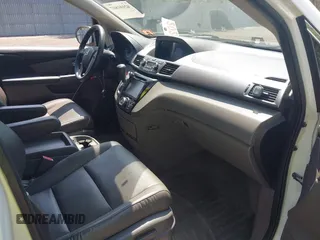 2015 Honda Odyssey EX-L with VIN 5FNRL5H64FB069742, listed as a IAAI auction lot 42101807 with 152,611 mi miles and . Bid and sale history available at DreamBid. Image 5.