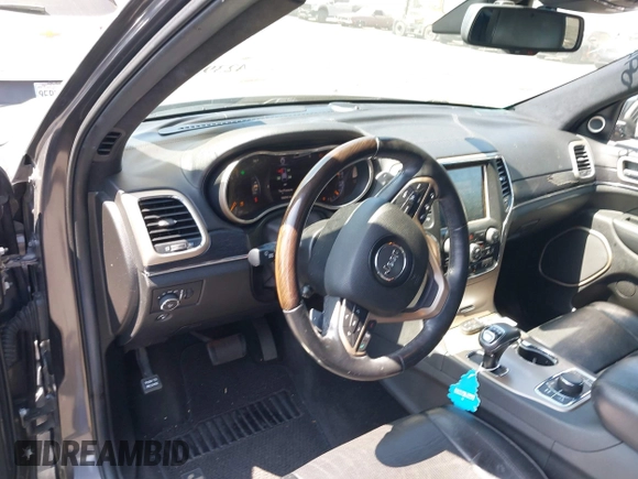 2014 Jeep Grand Cherokee Summit with VIN 1C4RJFJG8EC434899, listed as a IAAI auction lot 42399912 with 186,840 mi miles and . Bid and sale history available at DreamBid. Image 20.