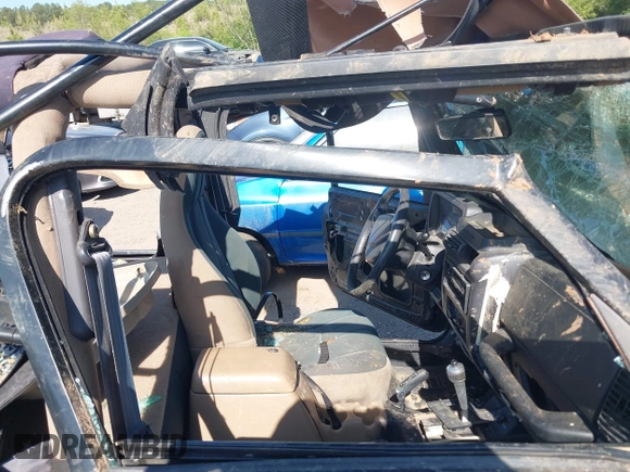1999 Jeep Wrangler Sahara with VIN 1J4FY49S2XP466068, listed as a IAAI auction lot 42062789 with Not provided miles and . Bid and sale history available at DreamBid. Image 5.
