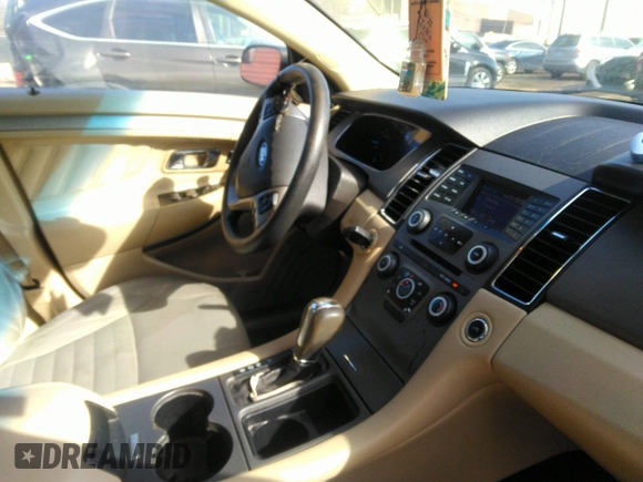 2014 Ford Taurus SE with VIN 1FAHP2D82EG167913, listed as a IAAI auction lot 41710659 with 155,738 mi miles. Bid and sale history available at carsss.com. Image 5.