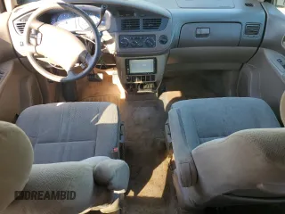 2002 Toyota Sienna LE with VIN 4T3ZF13C72U506585, listed as a Copart auction lot 77424794 with 253,337 mi miles and Clean Title. Bid and sale history available at carsss.com. Image 8.