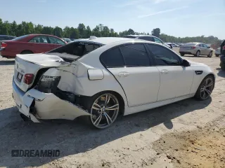 2014 BMW M5 with VIN WBSFV9C54ED097879, listed as a Copart auction lot 61380464 with 78,367 mi miles and Salvage Title. Bid and sale history available at carsss.com. Image 3.