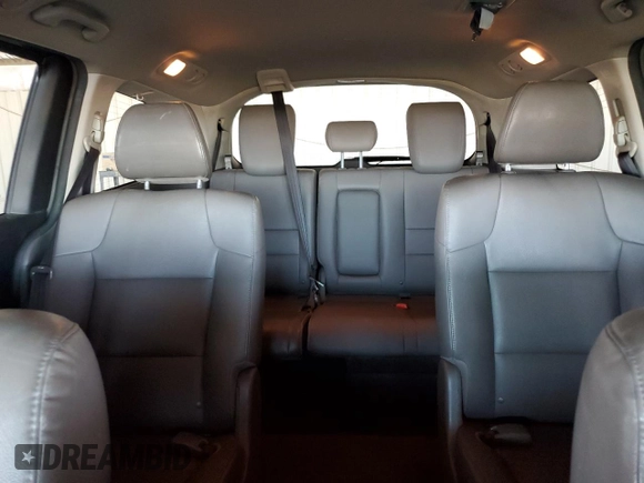 2014 Honda Odyssey Touring with VIN 5FNRL5H99EB111525, listed as a Copart auction lot 61986005 with 137,905 mi miles and Salvage title. Bid and sale history available at DreamBid. Image 10.