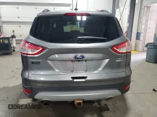 2014 Ford Escape SE with VIN 1FMCU9G96EUE53240, listed as a Copart auction lot 51920455 with 180,948 mi miles and Salvage Title. Bid and sale history available at DreamBid. Image 6.