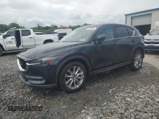 2019 Mazda CX-5 Grand Touring with VIN JM3KFBDM8K0507156, listed as a Copart auction lot 63407555 with 181,863 mi miles and Salvage title. Bid and sale history available at DreamBid. Image 1.