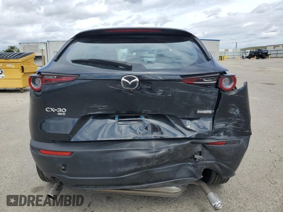 2023 Mazda CX-30 S with VIN 3MVDMBAM7PM555455, listed as a Copart auction lot 51268345 with 34,552 mi miles and Salvage Title. Bid and sale history available at carsss.com. Image 6.